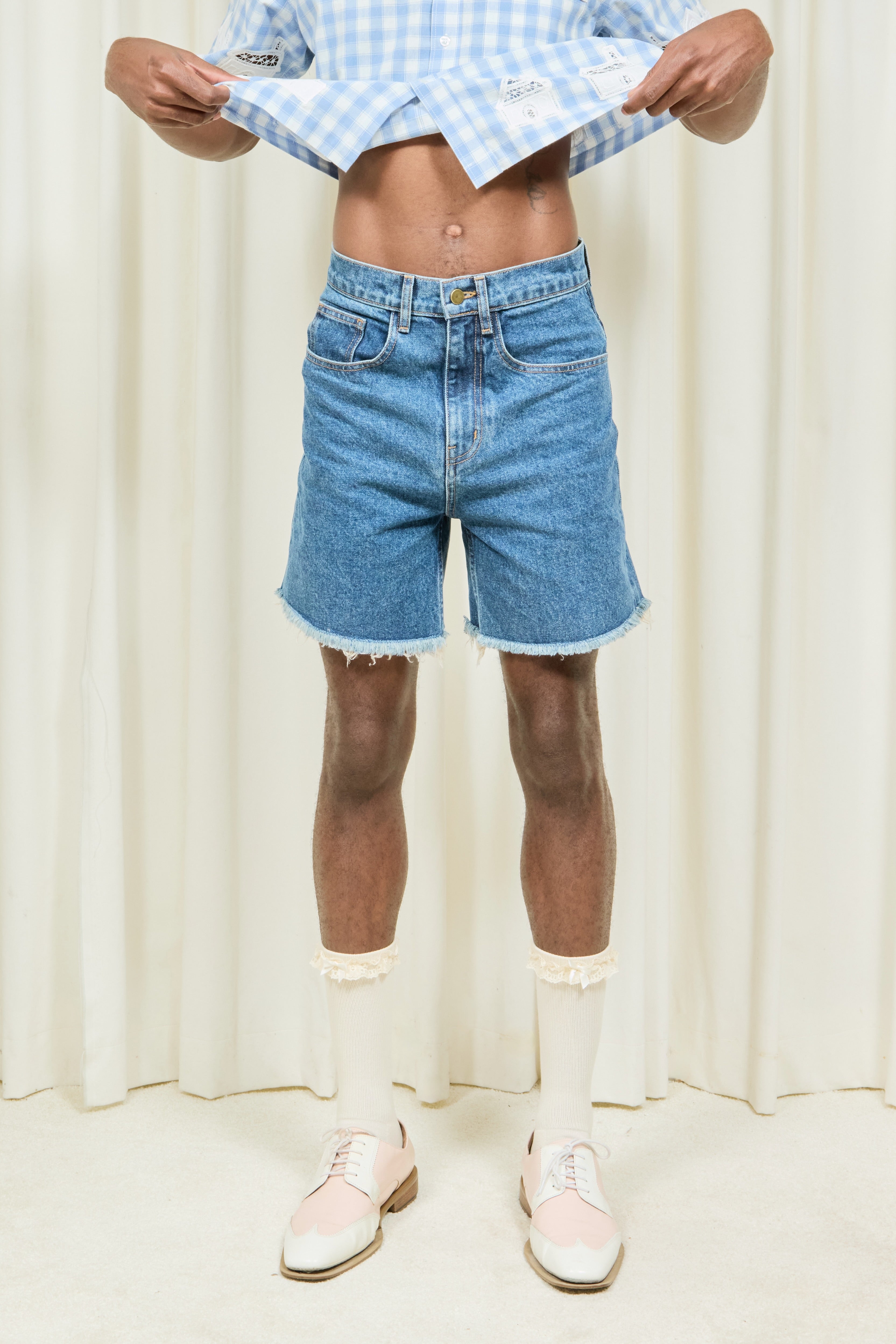 Brad Cutoff Mid Length Jean Short
