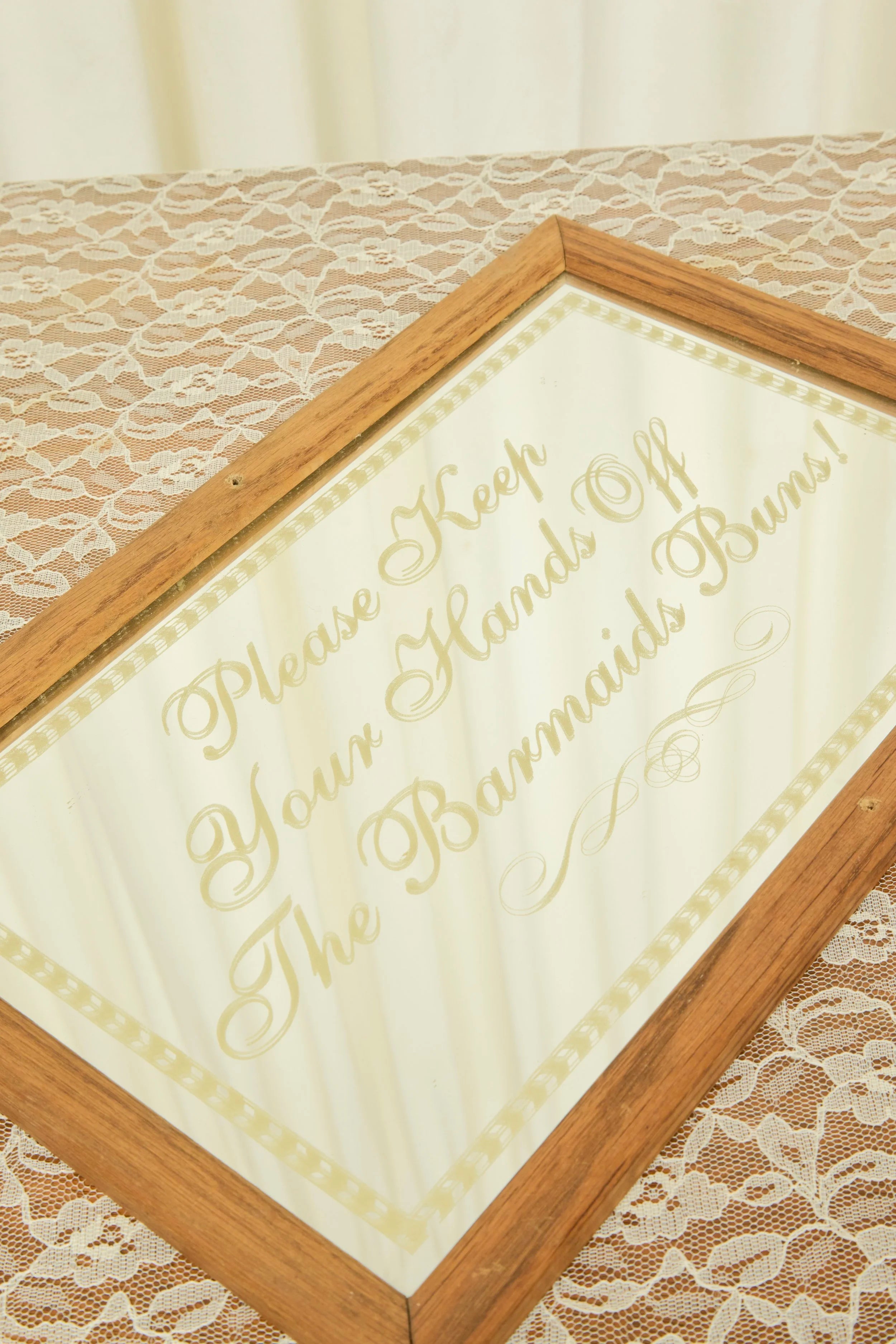 Vintage "Barmaids Buns" Mirror